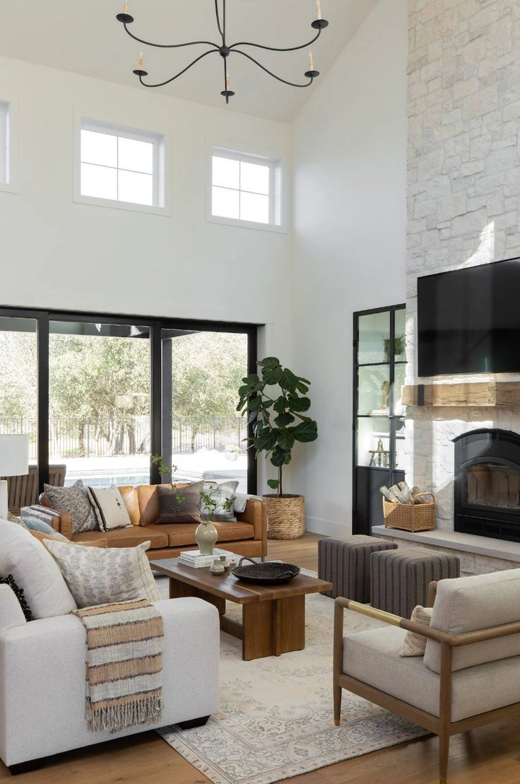 Modern living room renovation by Plagos Construction